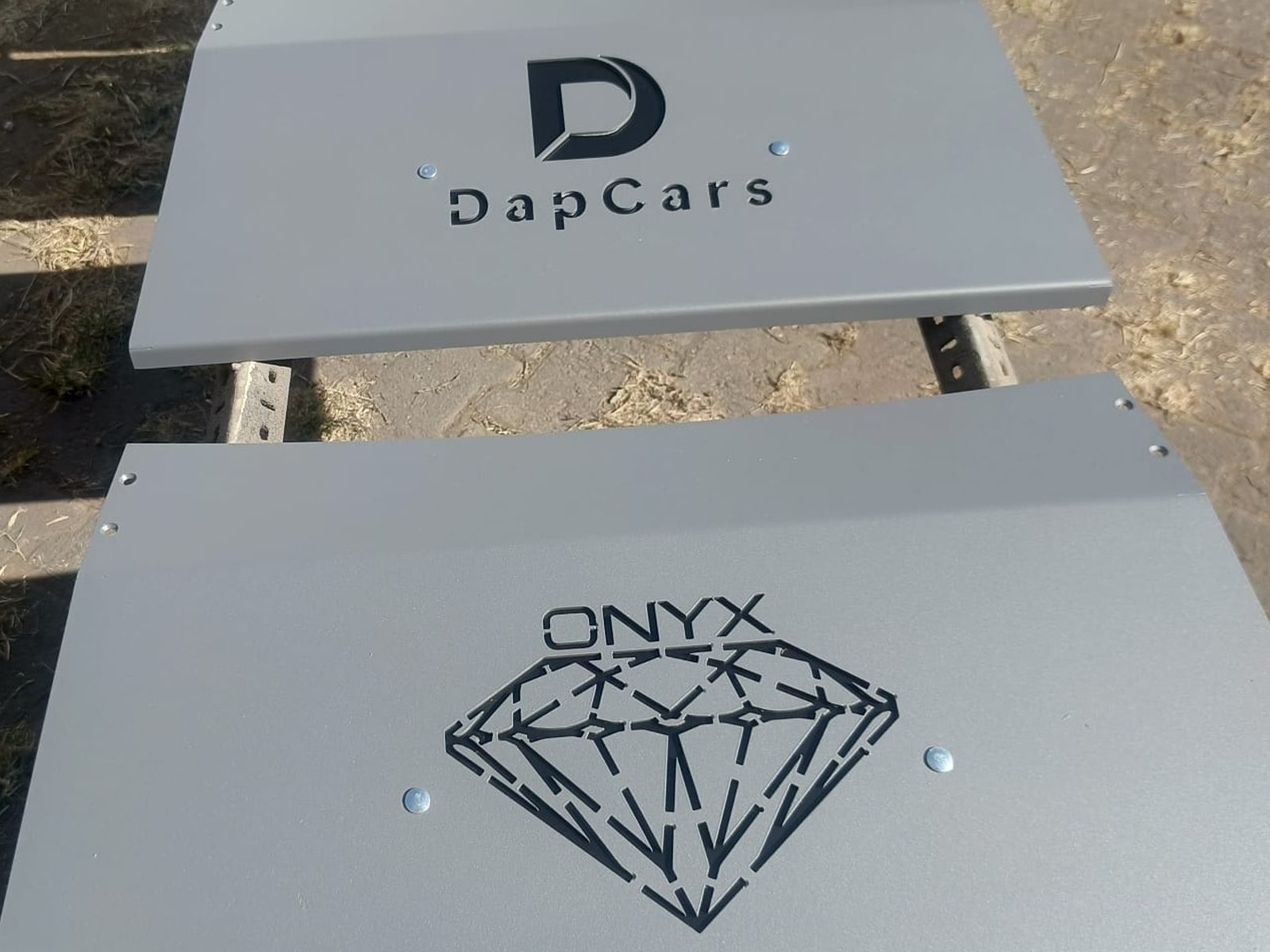 Ramp panels with the customer's logo cut into them — DapCars and ONYX